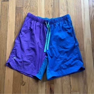 Fabletics purple and blue 7 inch shorts